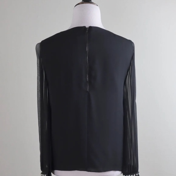 $440 Alice and Olivia black blouse - Picture 7 of 9